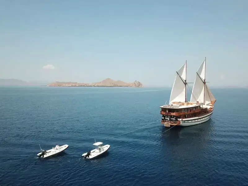 Phinisi with tenders off Komodo