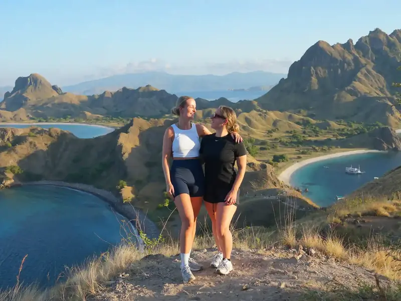 Two travellers above the bays of Padar Island