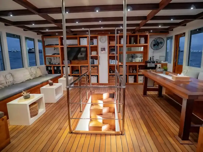 Teak saloon and library aboard a phinisi