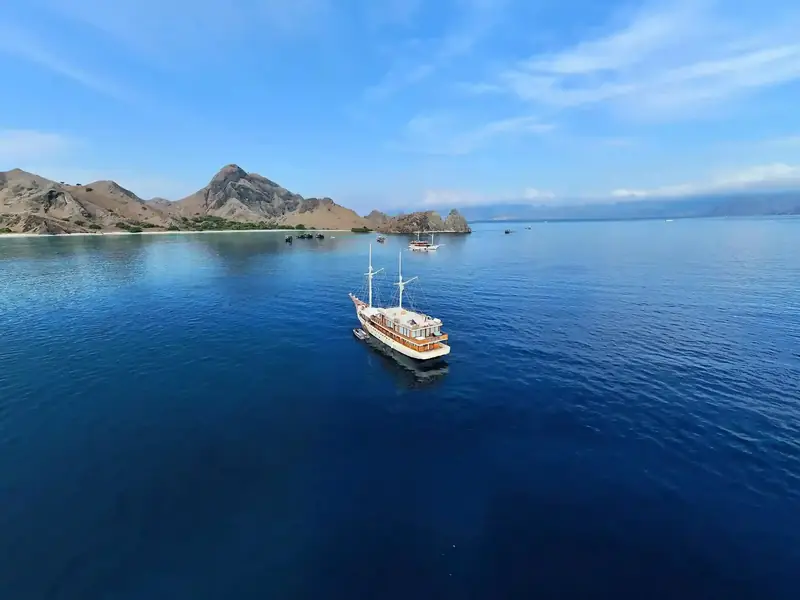 Phinisi on a calm bay in Komodo National Park