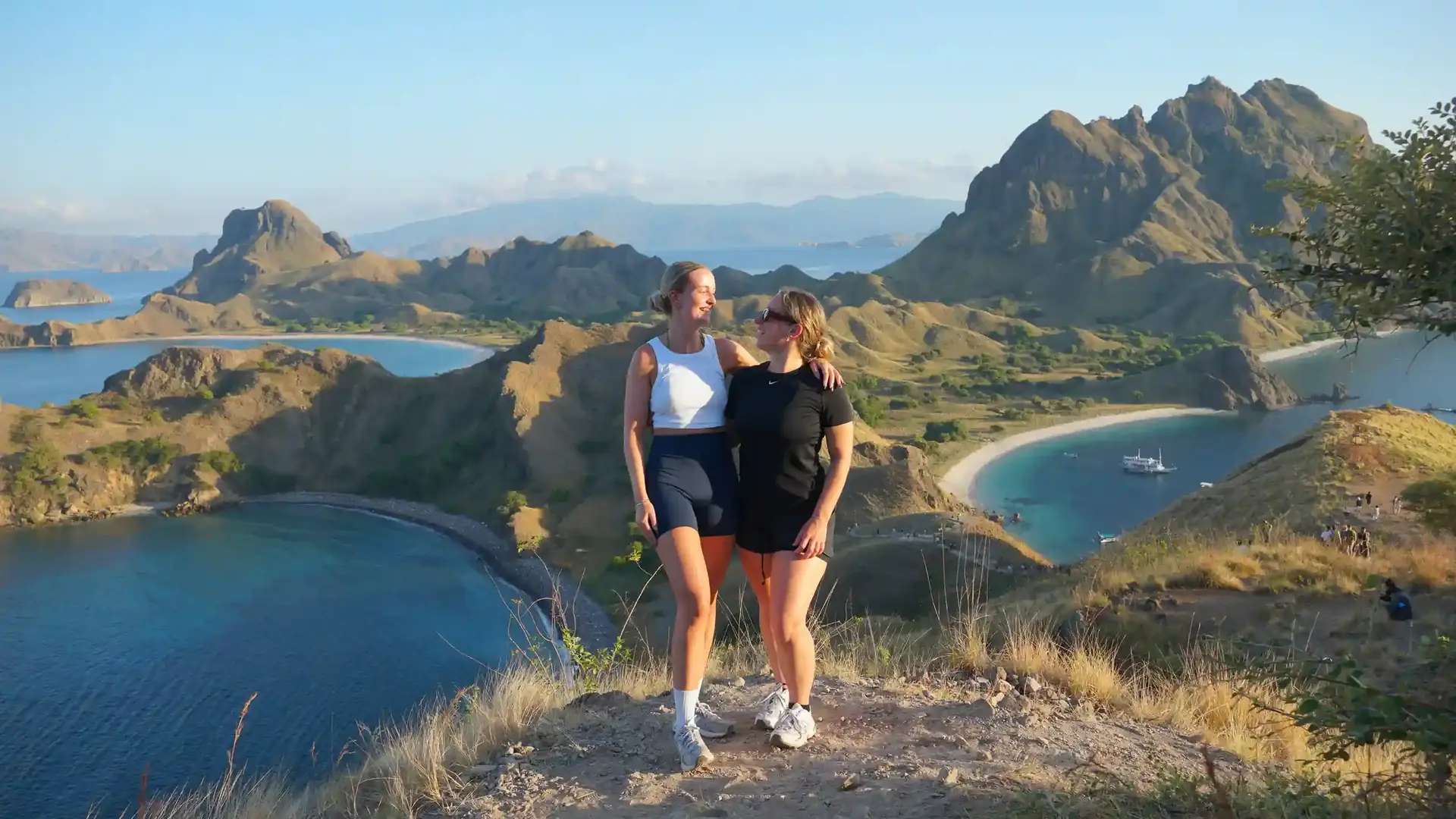 Two travellers looking out over the bays of Padar Island