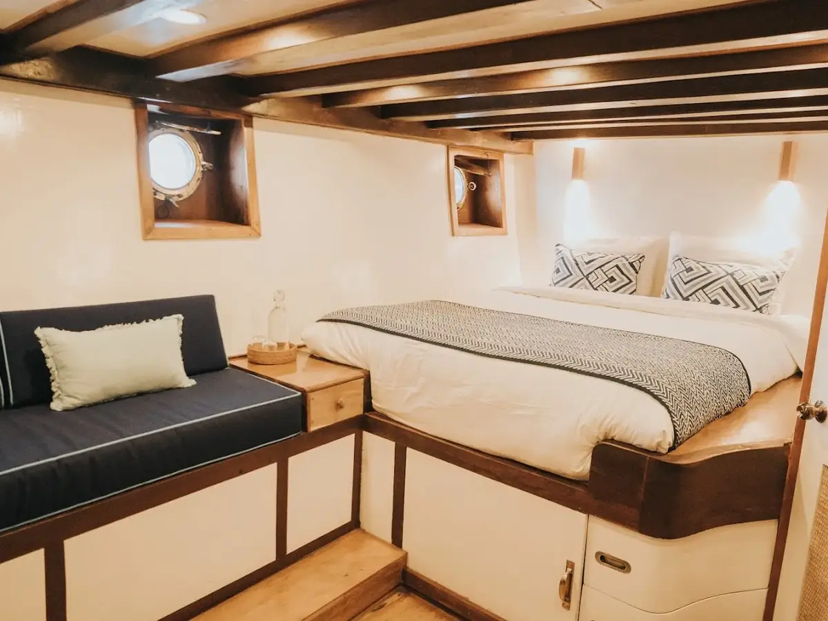 Standard cabin with teak joinery aboard a phinisi