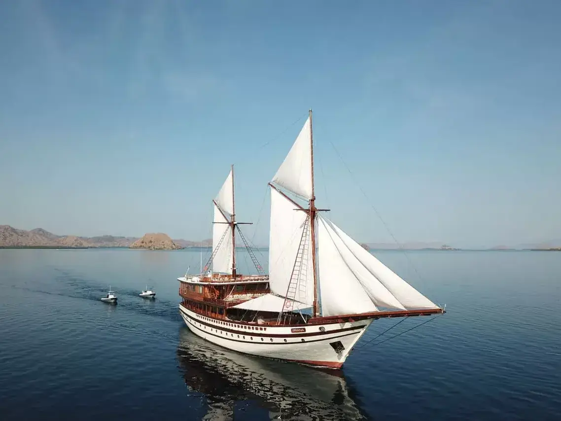 Phinisi under white sail